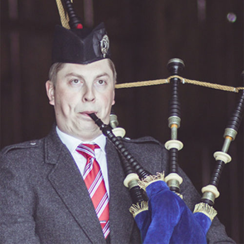 Palmer Shonk portrait playing bagpipes